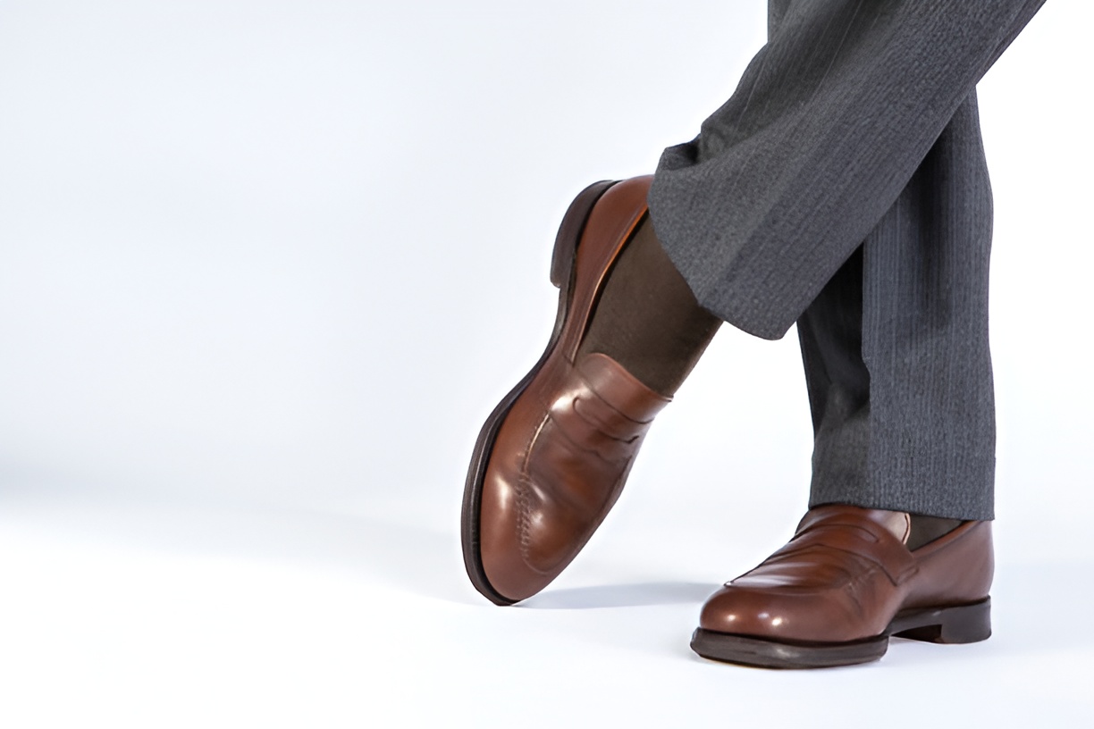 man wearing brown socks and loafers